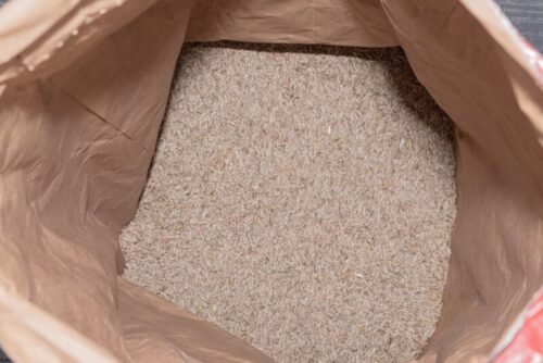 Lawn,Grass,Seeds,In,A,Large,Paper,Bag,,Top,View,